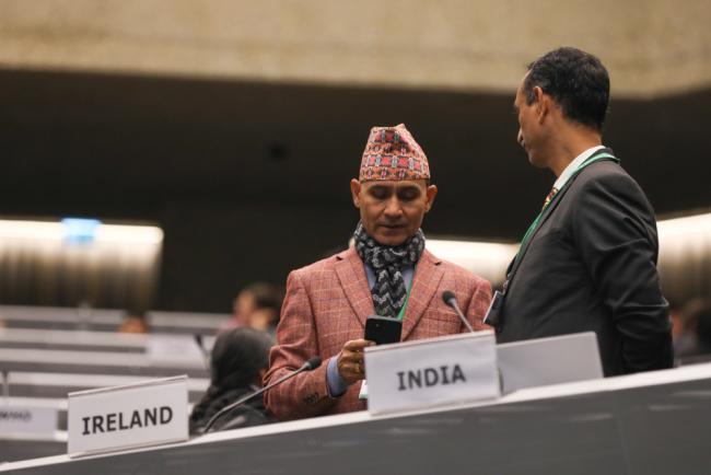 Delegates speak informally