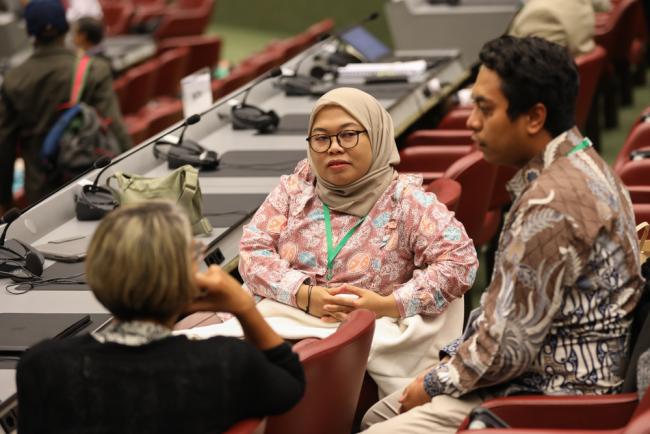 Delegates speak informally