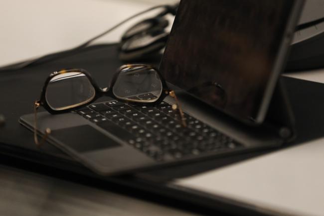 Glasses on laptop