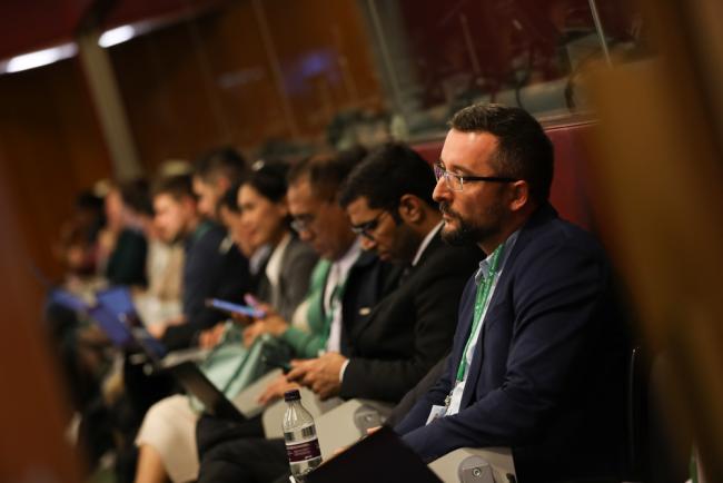 Delegates listen during the contact group