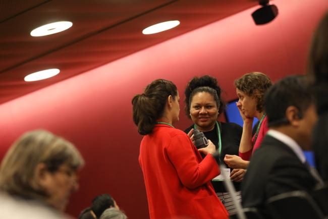 Delegates speak informally