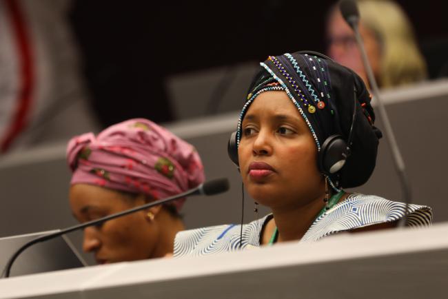 Representatives from different Indigenous Peoples and local communities listen to the deliberations