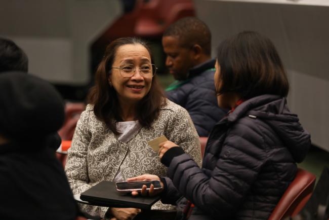 Delegates from Lao People's Democratic Republic consult