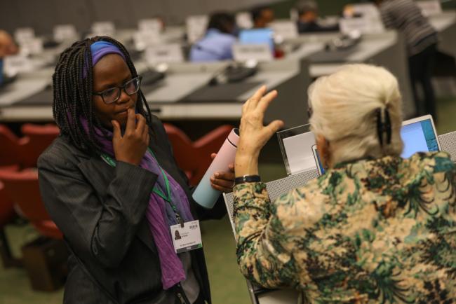 Delegates speak informally