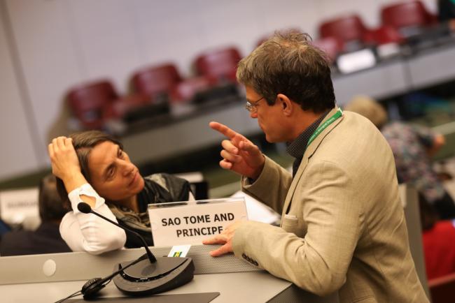 Delegates speak informally