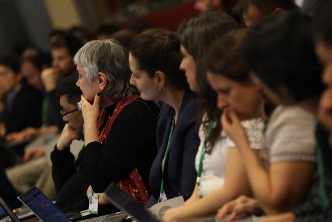 Delegates consider the different opinions being shared