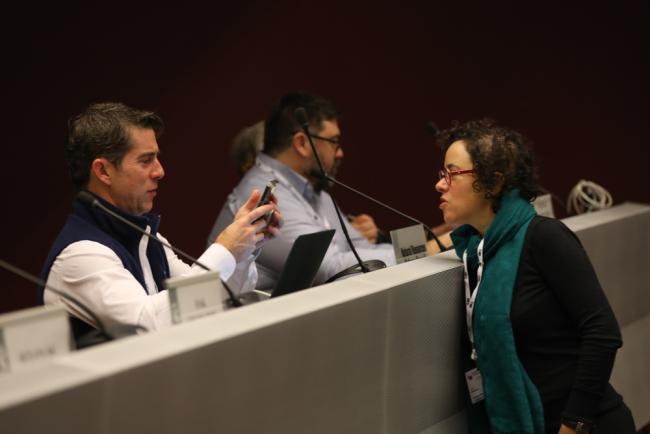 Delegates speak informally
