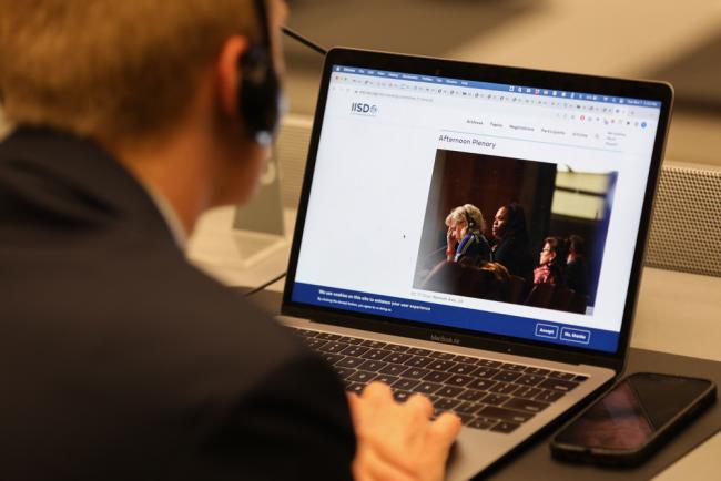 Delegates visit the ENB website to view photos of the day