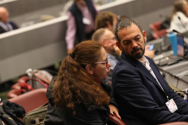 Delegates speak informally