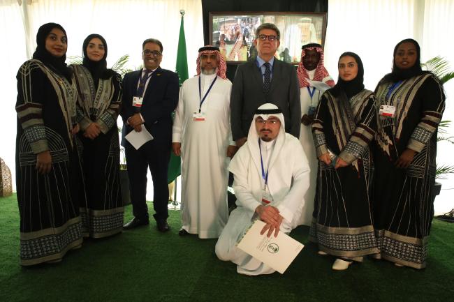 INC Chair Gustavo Meza-Cuadra, Peru pose for a group photo with delegates from the United Arab Emirates and Saudi Arabia 