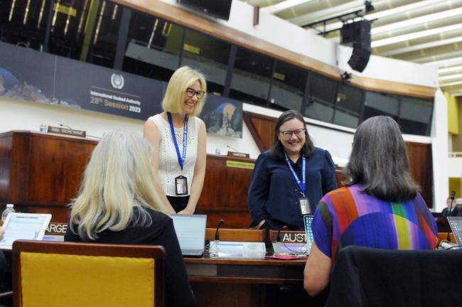 Lisa Koch and Joe Feldman, Norton Rose Fulbright, Australia, share a laugh with the Australian delegation