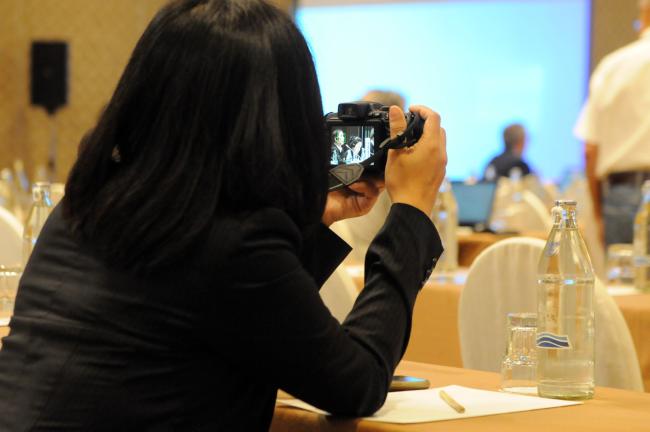 A participant takes a photo of Chheang Dany, Cambodia