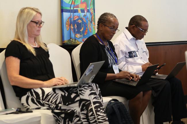 Participants taking notes 