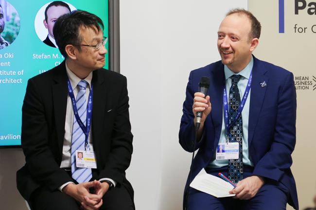 Wim Chang, CEO, Delta Electronics Foundation, and Stefan Buettner, UN Economic Commission for Europe- Delta - SideEvent - 8dec2023 - Photo