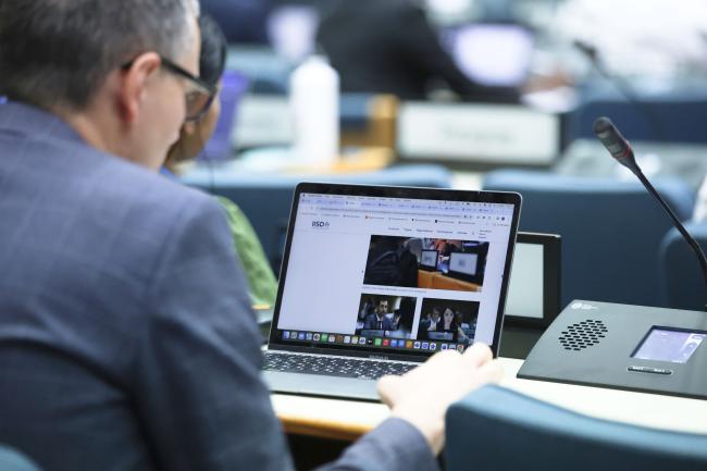 A delegate checks the previous day's ENB webpage 