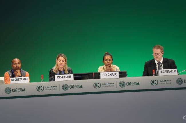View of the dais during informal consultations on the rules, modalities and procedures for the mechanism established by Article 6, paragraph 8, of the Paris Agreement