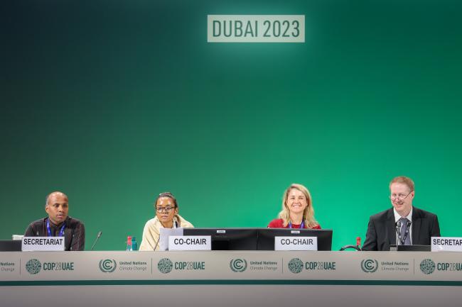 View of the dais during informal consultations on the rules, modalities and procedures for the mechanism established by Article 6, paragraph 8, of the Paris Agreement