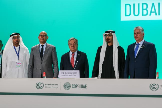 From L-R: Ahmed bin Ali Al Sayegh, Minister of State, UAE; UNFCCC Executive Secretary Simon Stiell; UN Secretary-General António Guterres; Sheikh Mohamed bin Zayed Al Nahyan, President of the UAE; and Miguel Díaz-Canel, President of Cuba