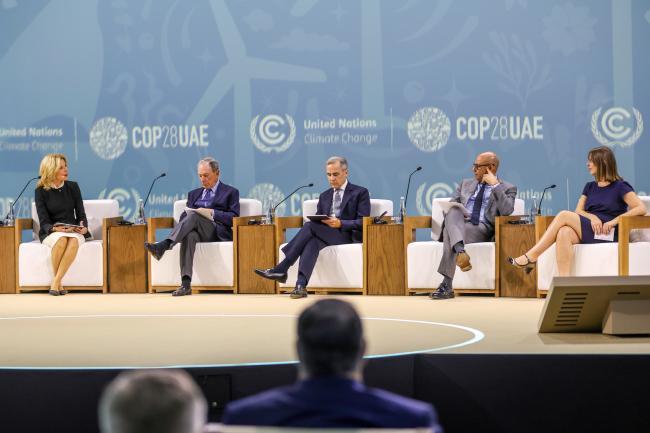 From L-R: Melinda Crane, journalist; Michael R. Bloomberg, UN Special Envoy on Climate Ambition and Solutions; Mike Carney, UN Special Envoy for Climate Action and Finance; UNFCCC Executive Secretary Simon Stiell; and Faustine Delasalle, CEO, Mission Possible Partnership