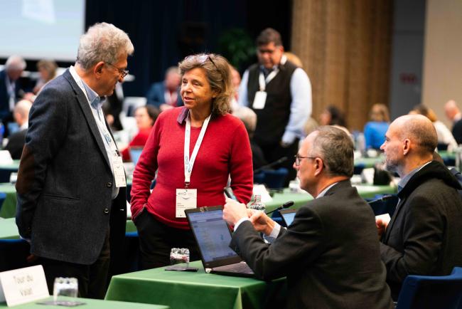 Members of Civil Society conferring before the closing plenary