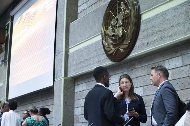 Tessa Goverse, Principal Coordinator, Secretariat, cosults with Alvin Gachie, Legal Advisor, and Ulf Björnholm, Secretariat