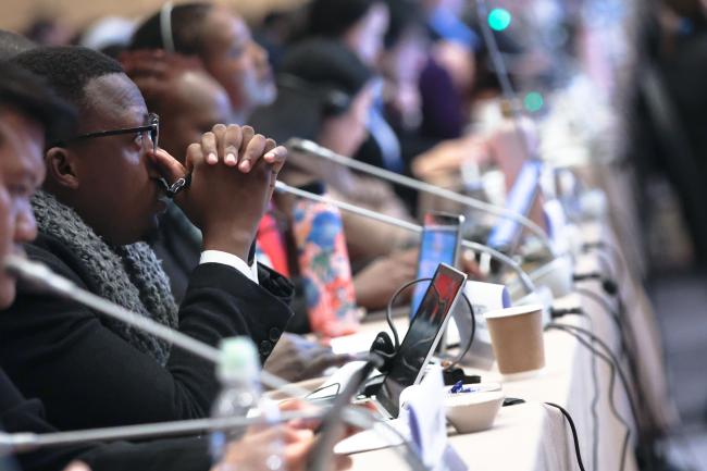 Delegates following the proceedings 