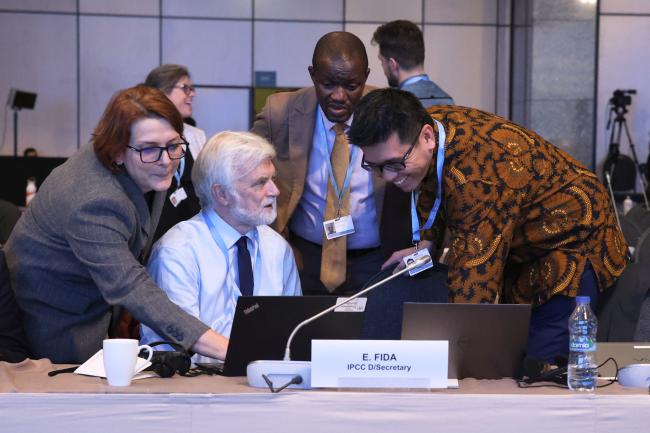 IPCC Deputy Secretary Emira Fida, IPCC Chair Jim Skea, IPCC Vice-Chair Ladislaus Chang'a, and WGII Co-Chair Winston Chow 