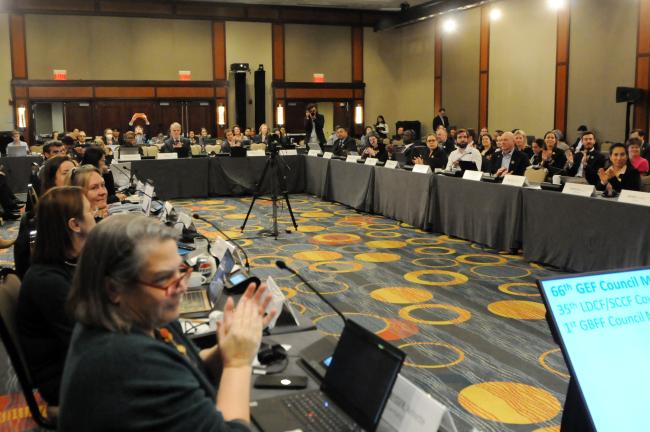Council Members applaud Council Secretary William Ehlers for his years of service to GEF Secretariat
