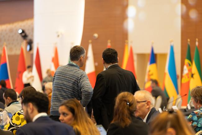Delegates speak informally