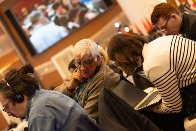 Delegates speak informally