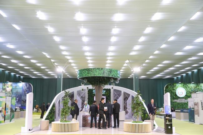 Delegates visit the exhibition space to see a variety of information on display