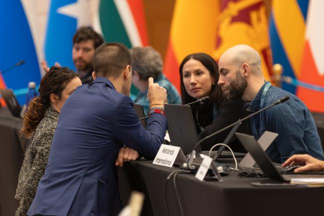 Delegates consult