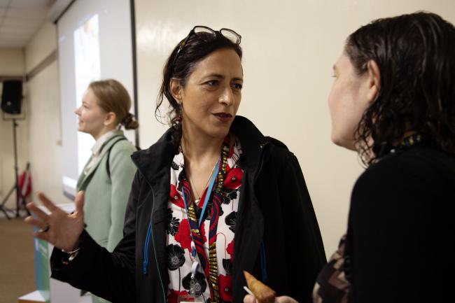 Participants confer