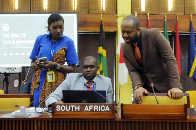 Bongani Sayidini, South Africa, with delegates from Côte d'Ivoire and Sierra Leone