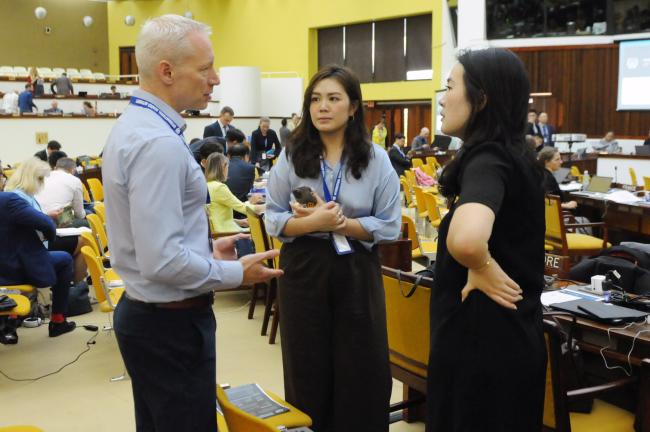 Corey McLachlan, Nauru Ocean Resource Inc. (NORI), with Beatrice Chen and Charisse Lau, Singapore