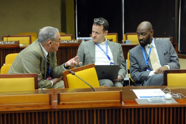 Delegates discuss informally