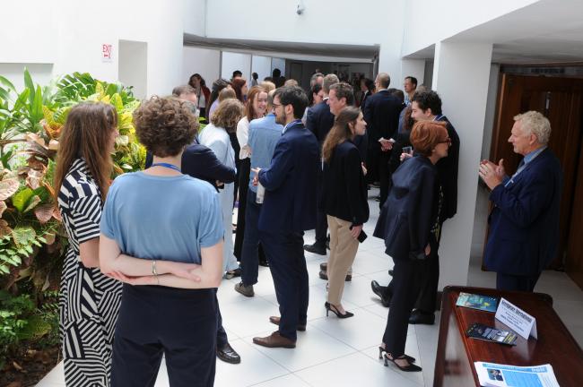 Participants chat outside