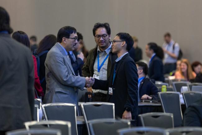 Delegates meet informally at the start of the session