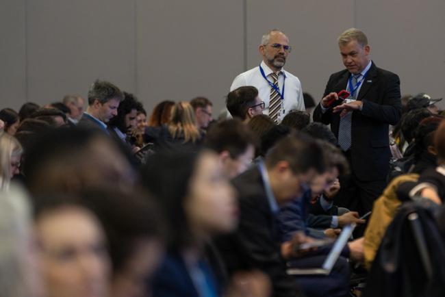 Björn Beeler, International Pollutants Elimination Network (IPEN), speaks with delegates