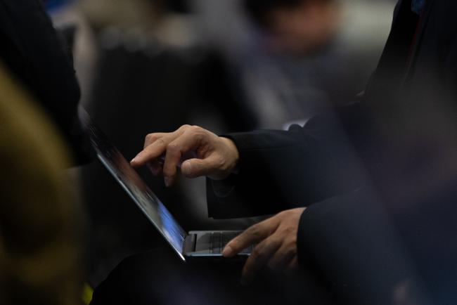 Delegates review the negotiating text