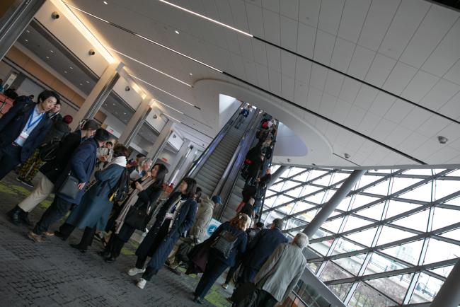 Delegates arrive at the venue for the start of the second day of INC-4