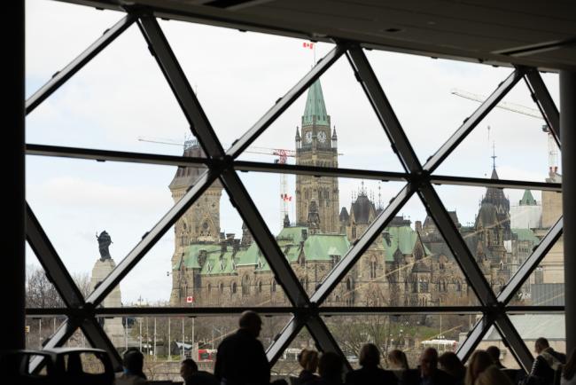Delegates enjoy the view of Canadian Parliament from the conference center