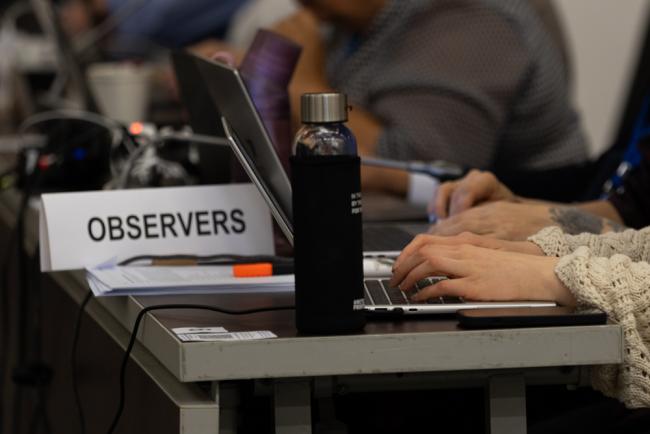 Delegate takes notes