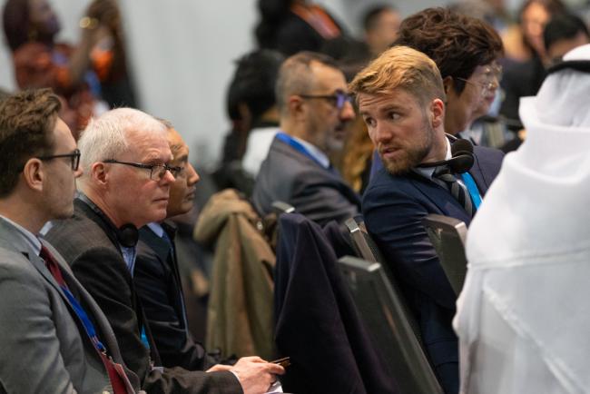 Delegates consult informally