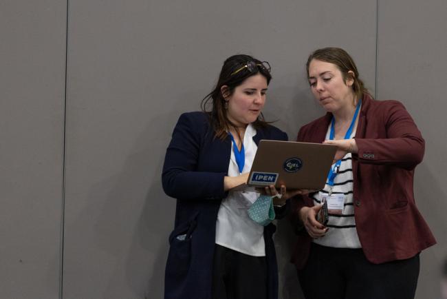 Representatives of civil society consult during the session
