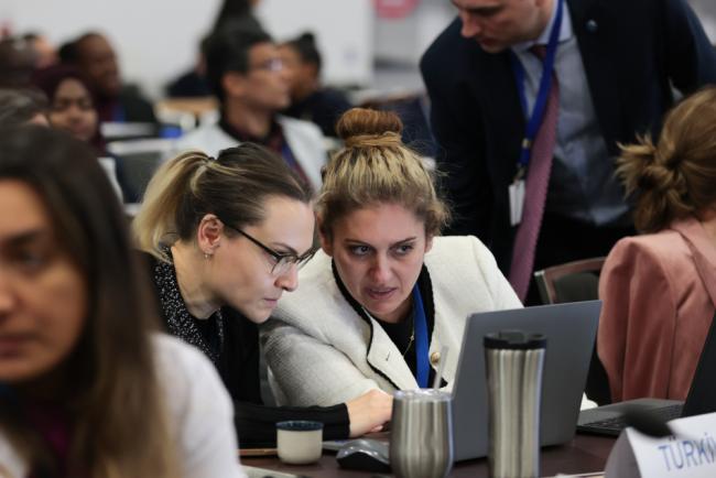 Delegates consult