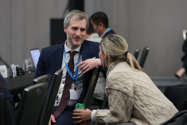 Delegates consult