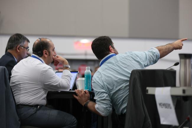 Delegates consult