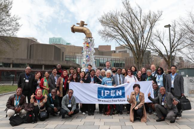Family photo of the International Pollutants Elimination Network (IPEN) team attending INC-4