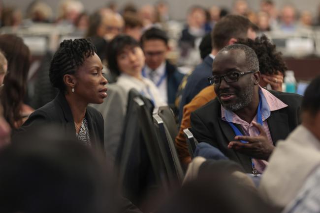 Delegates consult